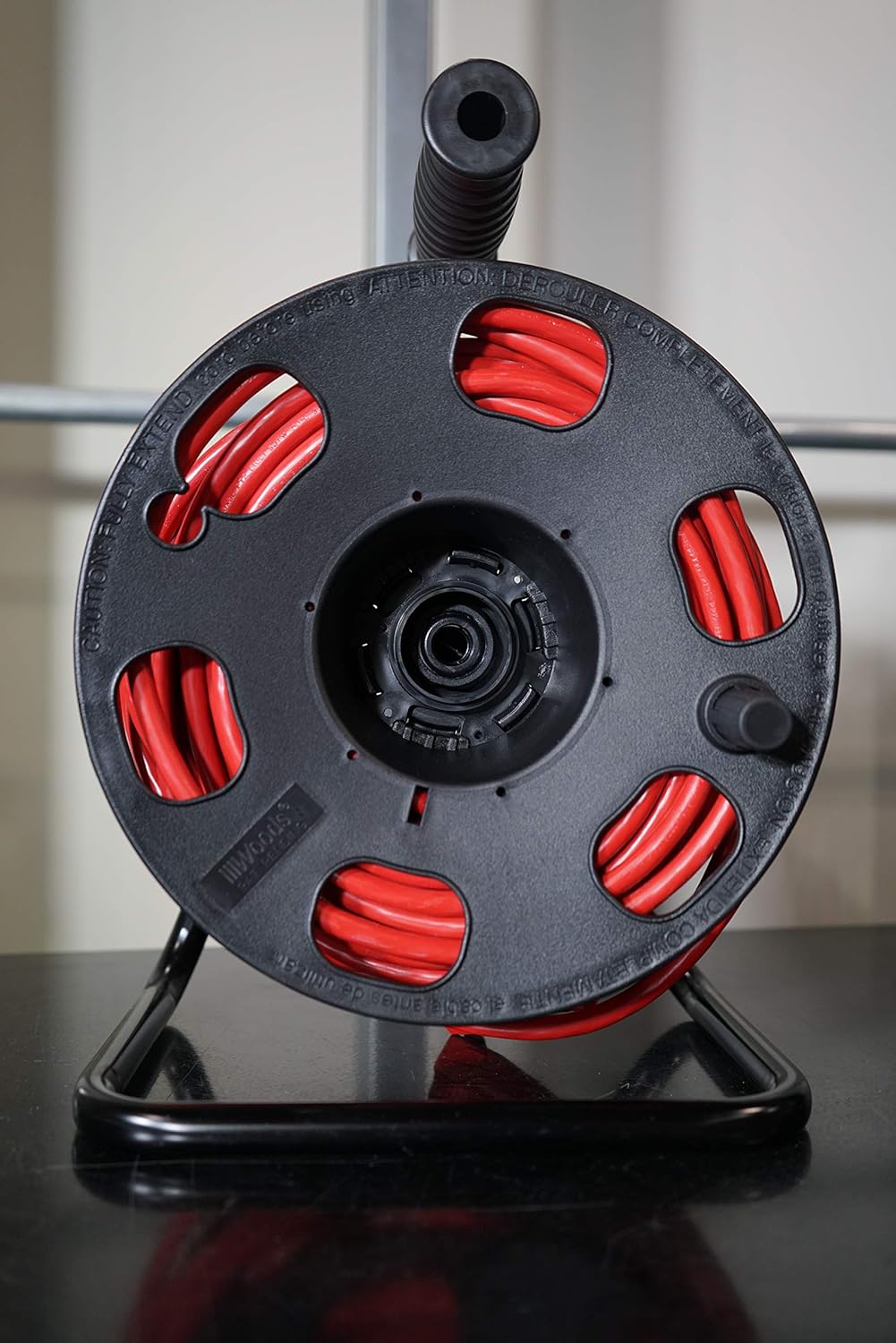 Woods 22849 Metal Extension Cord Reel Stand In Black, Heavy Duty, Quick Snap Together Design, Sturdy and Durable Stand, Easy to Grip Handles, Holds Up To 100 Feet, 14/3 Gauge Cord - Image 9